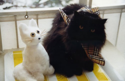 Снеговики, похожие на собак и кошек (11 фото)